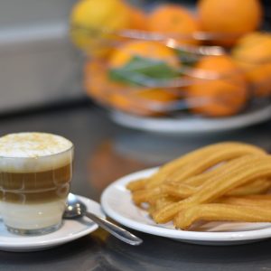 Tomar Café con churros La Latina